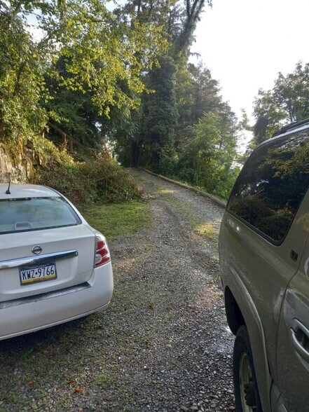 parking behind house, 2 spots available - 834 College Ave