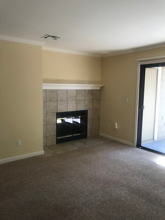 Wood burning fireplace in living room - 351 Eastridge Dr