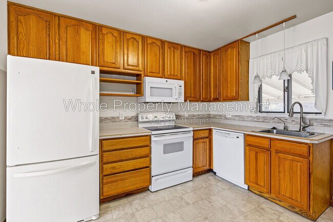 Building Photo - 1406 E 108th Pl