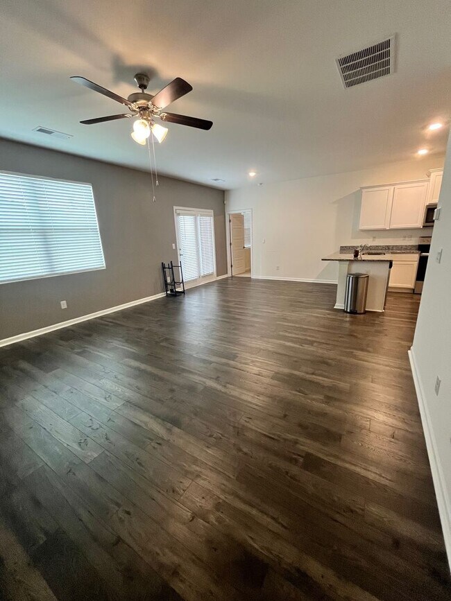 Building Photo - HALF-PRICE RENT for Your First Month: Move...