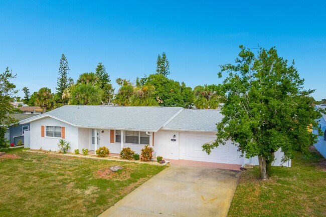 Building Photo - Welcome to your Perfect Beachside Retreat!