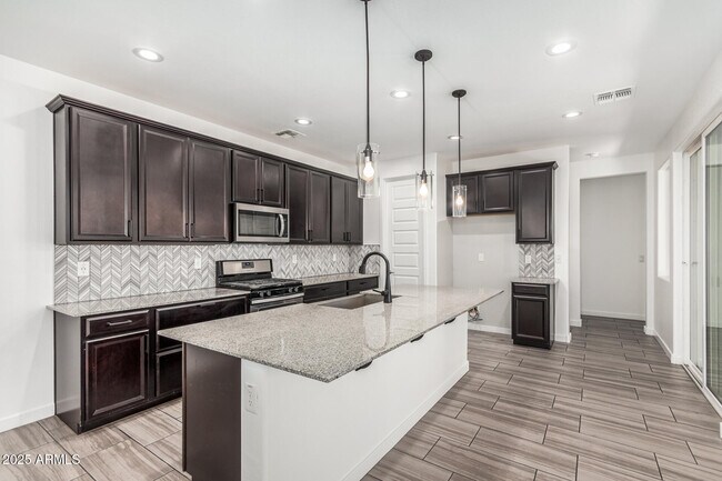 Building Photo - 7138 W Kent Dr