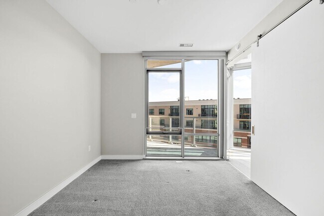 Building Photo - 6th Floor 1BD, 1.5BA Condo at the Lakehouse off Sloan's Lake