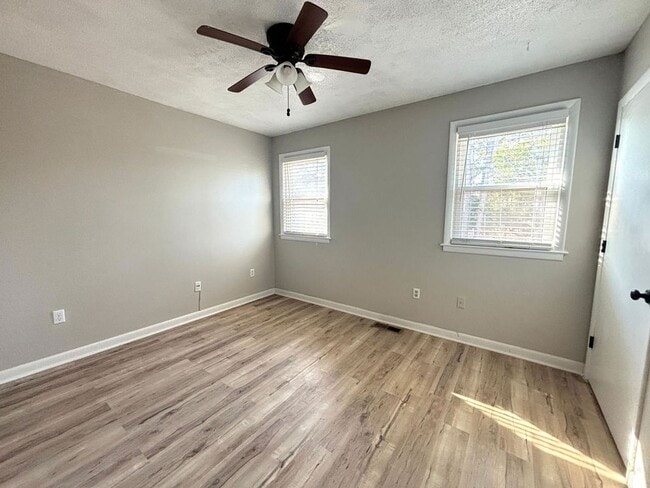 Building Photo - Available now. Water included! Great 2BR/1.5 BA Townhouse in Central James Island!