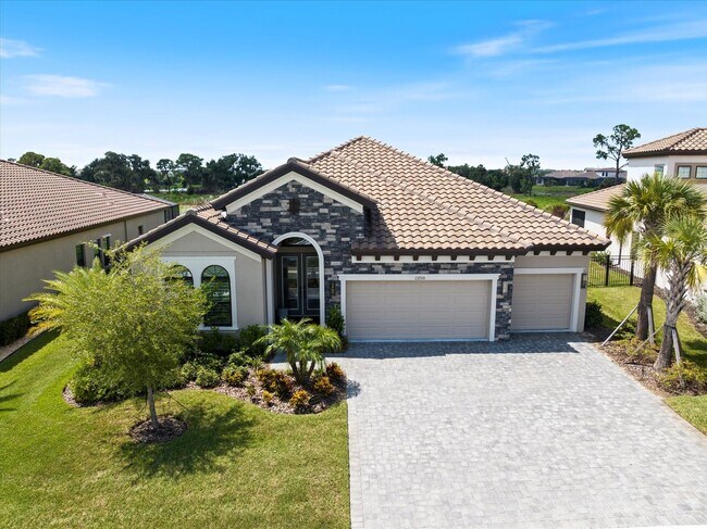 Building Photo - Luxury Home w/ Pool, Outdoor Kitchen, Car Lift, & Water View In Parrish!