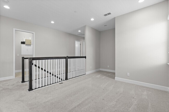 Building Photo - Move In Ready End Unit Townhome in Laureate Park | 3 Bed | Tesla Charger