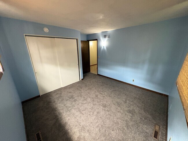 Building Photo - Spacious Home with Attached Garage & Fenced Backyard