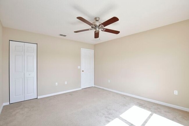 Building Photo - Spacious 3/2.5 End-Unit with Breathtaking Lake Views in Sanford!