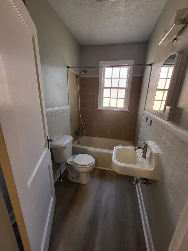 Building Photo - Remodeled 2 Bedroom 1 Bath Brick Duplex