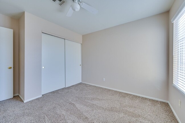 Building Photo - NW!! POOL!!!! GATED!!! Com. Park!!! Low Maintenance desert landscape front Yard. New Carpet!! Ups...