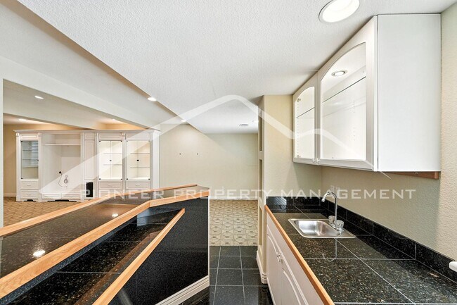 Building Photo - Luxury Meets Location – Impeccable 5BR Hom...