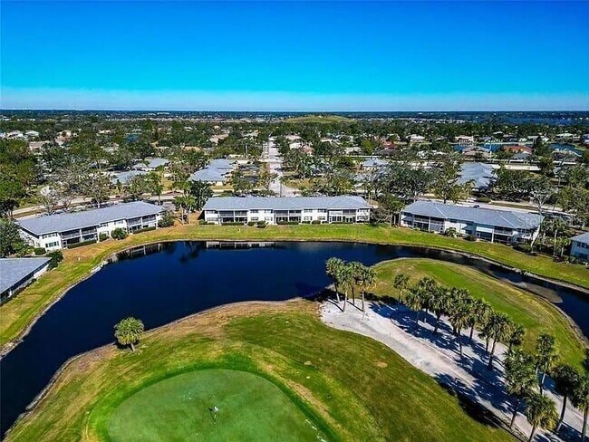 Building Photo - 6999 W Country Club Dr N