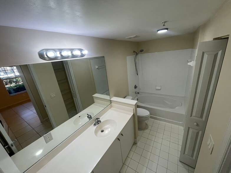 Bathroom w/closet - 5840 W Sample Rd