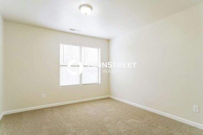 Building Photo - 4 Bedroom Pet-Friendly Home in GARNER, NC with Main Street Renewal