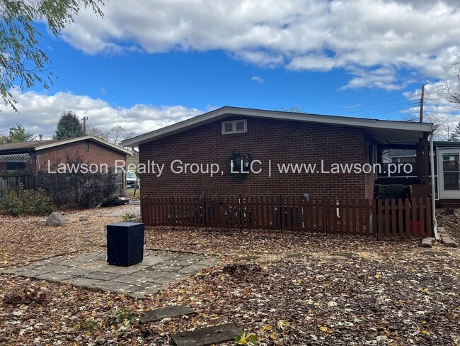 Building Photo - One Level Living- Beautifully Landscaped Yard and Attached Carport