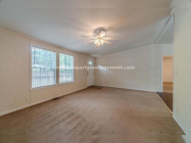 Building Photo - A COUNTRY DREAM! 4BR, 2BATH MANUFACTURED HOME, $1650./month