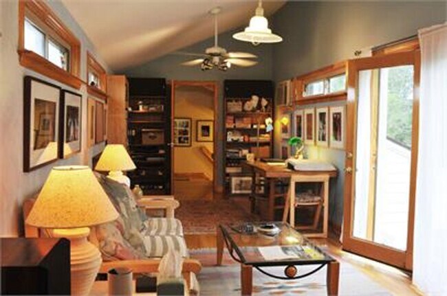 Building Photo - Unique 4 Bedroom with 2 Car Garage and out...