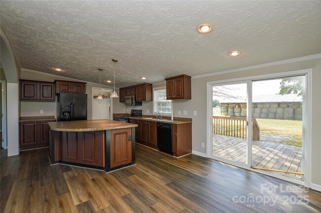 Building Photo - 711 W C J Thomas Rd