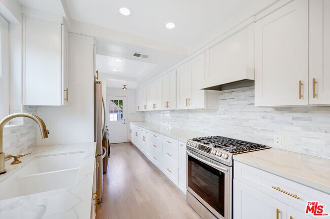 Building Photo - 149 S Kenter Ave