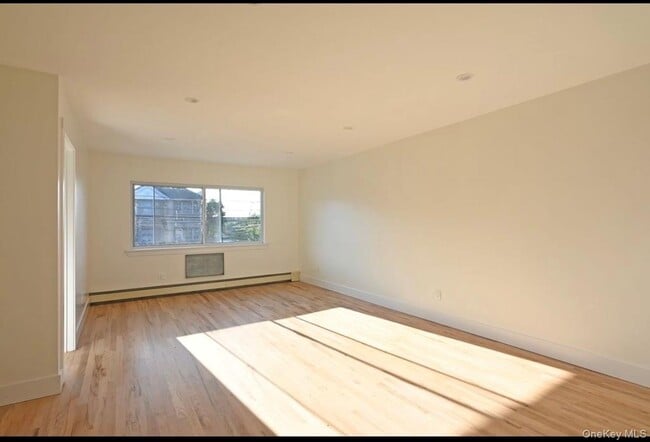 Building Photo - 19-43 76th St