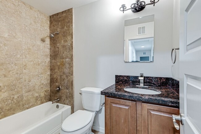 Building Photo - Spacious & Stylish 4/2 – Just  2 Miles fro...