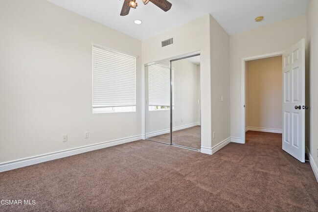 Building Photo - 6077 Mandeville Pl