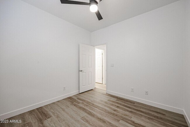 Building Photo - BRAND NEW 5 BEDROOM HOME IN PHOENIX