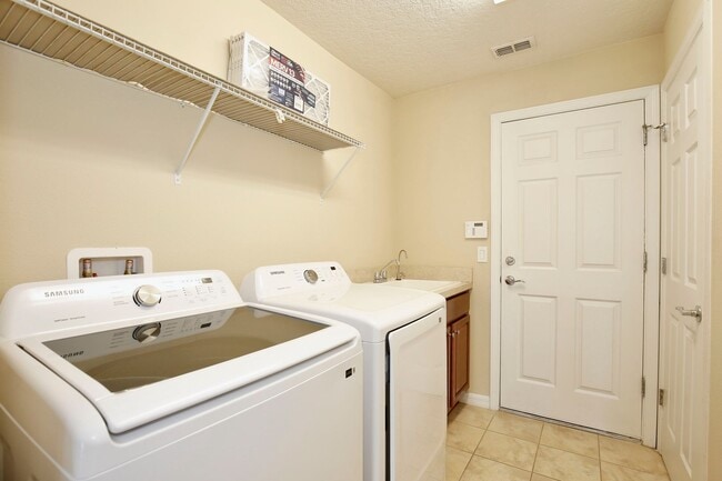 Building Photo - AGENT SHOWINGS ONLY! Gorgeous 2/2 + Den Mediterranean Villa with Waterfront Screened Patio and 2-...