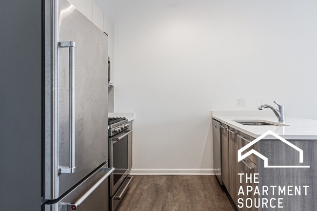 Building Photo - MASSIVE Loft-style condo-quality 2 Bed/2 ba IN UNIT LAUNDRY in Wrigley!
