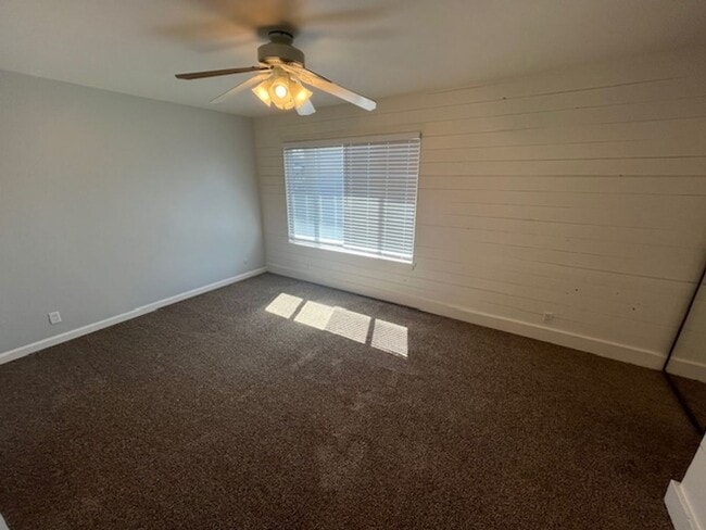 Building Photo - PETS OK!  2-story townhome with 2 bedrooms...