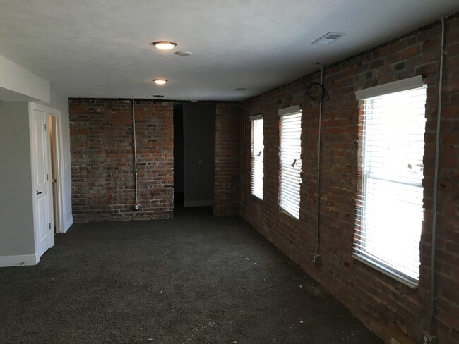 Building Photo - Modern One Bedroom Duplex at the Cottages -- A must-see!.