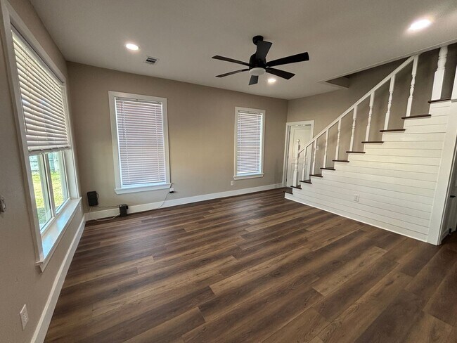 Building Photo - Welcome to this stunning new construction home located in the charming town of Atkins, AR.