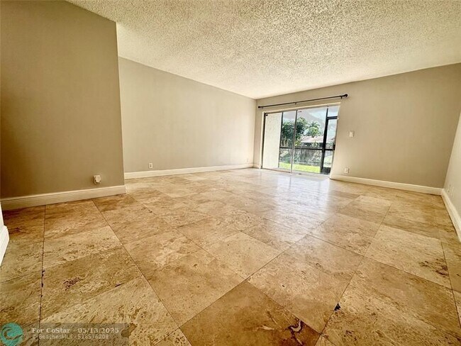 Building Photo - 717 Gardens Dr