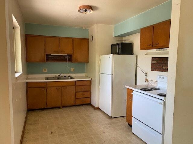 Building Photo - 1132 West 41st Terrace, Unit 7