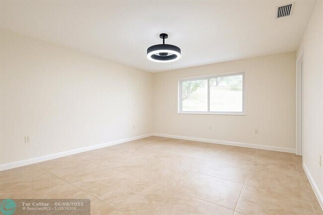 Building Photo - 11527 Royal Palm Blvd