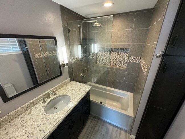 Building Photo - Sought-After 4 Bed 3 Bath L-Shaped Rambler...