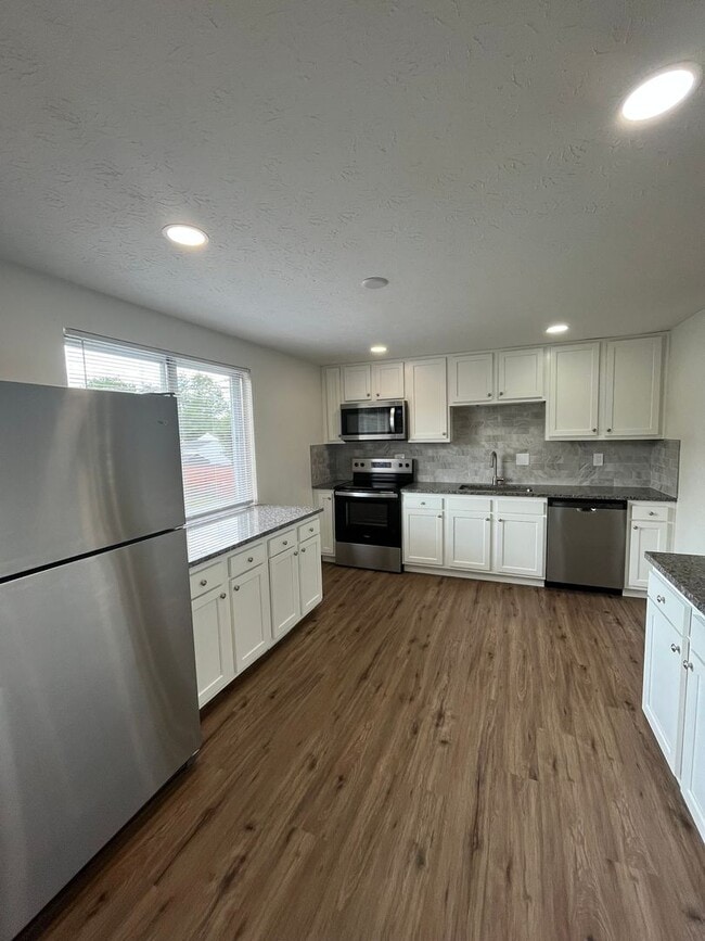 Building Photo - Renovated 5 Bedroom Home-Rare Find