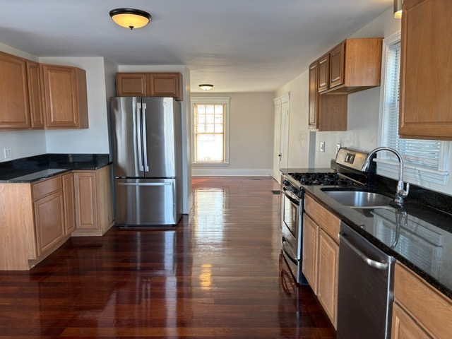 Unit 1 - kitchen view to living room - 381 Broadway