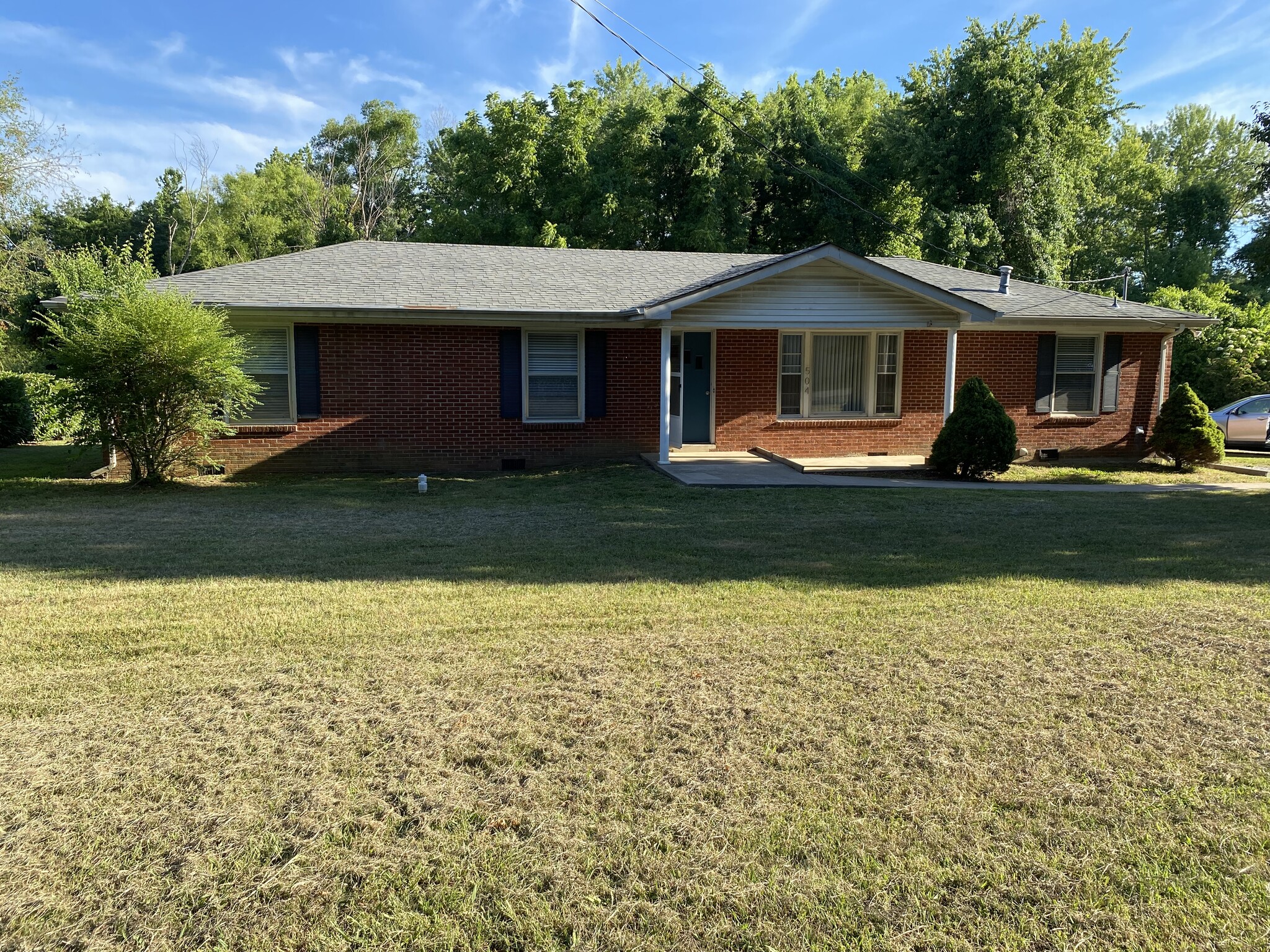 Front of house from newly asphalted road - 504 Luther Rd
