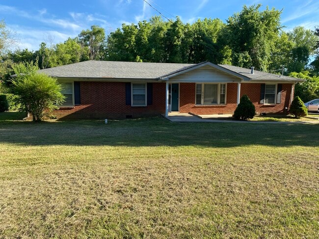 Front of house from newly asphalted road - 504 Luther Rd