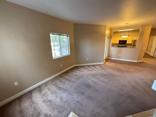 Building Photo - Gorgeous 2Bed/2Bath/2Car, 2nd-Story Condo located in the West part of the valley- Make the Move f...