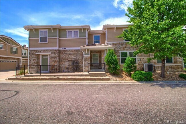 Building Photo - Bright Open-Concept Condo with 1-Car Garage in Prime Commuter Location