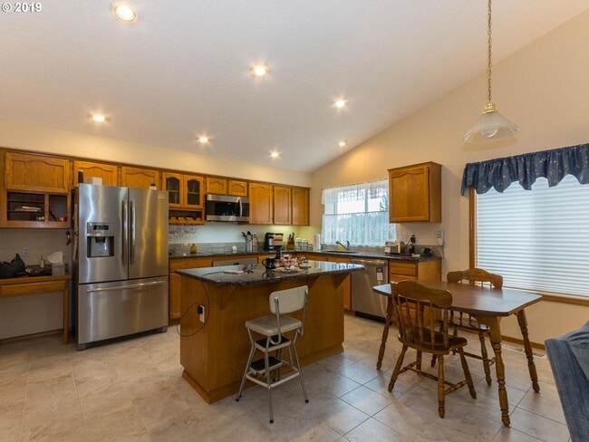 Building Photo - Charming 4-Bed, 2-Bath Home with Vaulted Ceilings, Dual Fireplaces & Serene Outdoor Spaces