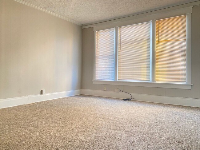 Building Photo - Coming Soon! Updated 4 bed 2 bath house right in the heart of Benson.