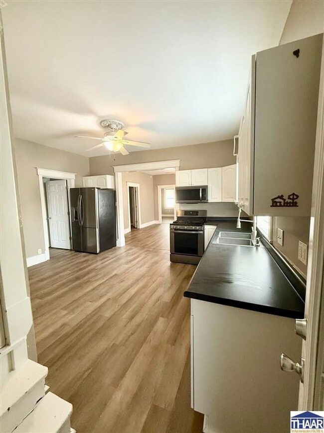 Building Photo - Renovated 3-Bedroom Home Steps from the 12...