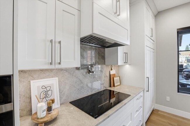 Building Photo - Modern 5-Bed Home in Atlas Waterfront — Elevator, Luxury Finishes & Prime Location