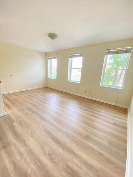 Living room is big & bright - 308 Main St