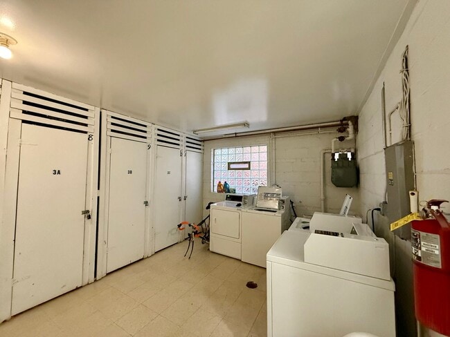 Building Photo - Pristine 2 Bedroom, 1 Bathroom Condo Available NOW! Heat, Water, & Parking INCLUDED in Rent!