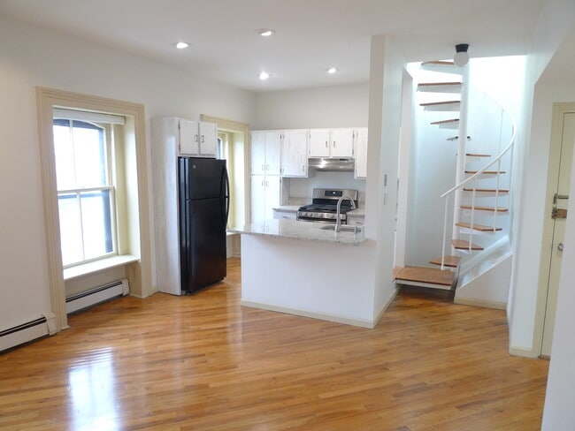 Kitchen & spiral stair to roof - 143 Sussex St