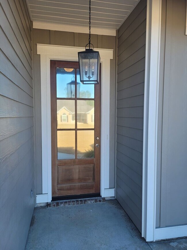 Building Photo - Spacious 4BR Home with Inground Pool, Open Split Floor Plan & Side-Entry Garage